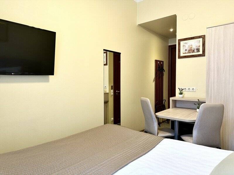 Фотографии номера Стандартная комната с большой кроватью 160*200 в Мини-отеле Невский контур Санкт-Петербург