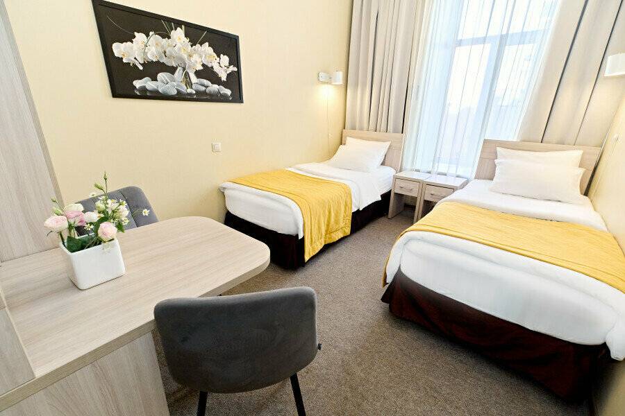 Фотографии номера Двухместный номер с 2 отдельными кроватями в Мини-отеле Невский контур Санкт-Петербург