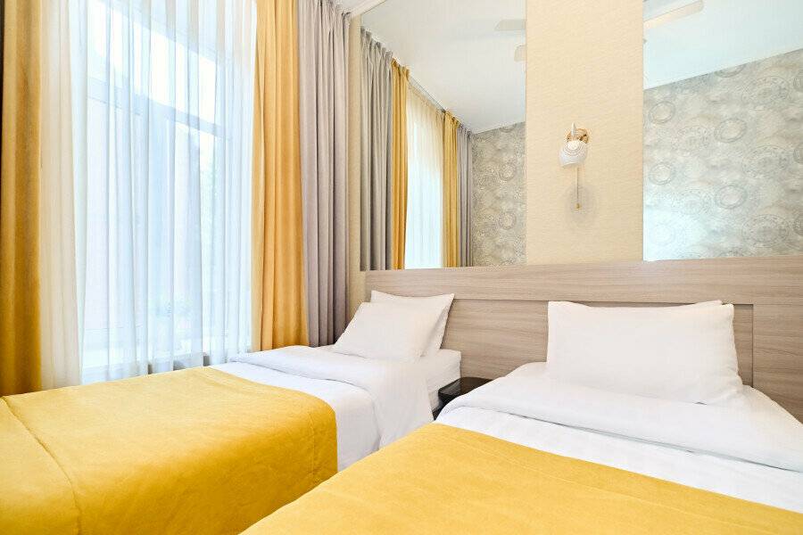 Фотографии номера Двухместный номер с 2 отдельными кроватями в Мини-отеле Невский контур Санкт-Петербург