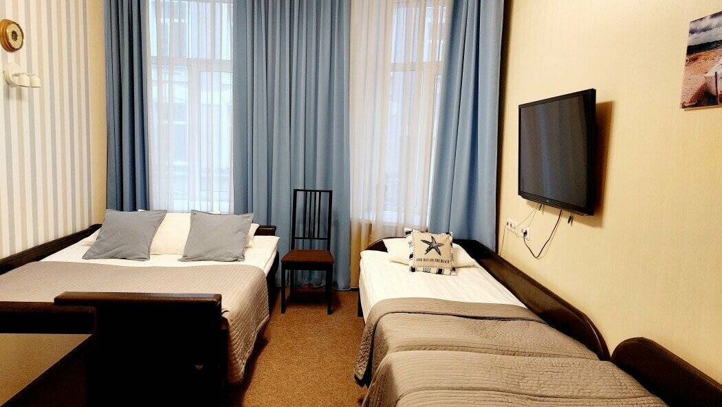 Фотографии номера Четырехместный номер «Комфорт» в Мини-отеле Невский контур Санкт-Петербург