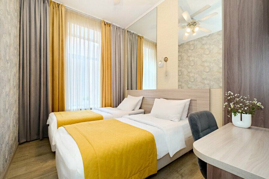 Фотографии номера Двухместный номер с 2 отдельными кроватями в Мини-отеле Невский контур Санкт-Петербург