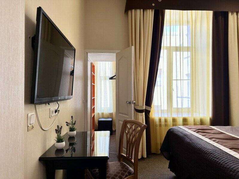 Фотографии номера Семейный двухместный номер с 1 кроватью в Мини-отеле Невский контур Санкт-Петербург