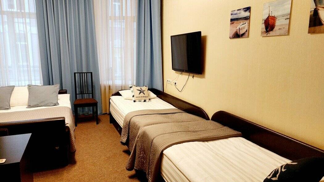 Фотографии номера Четырехместный номер «Комфорт» в Мини-отеле Невский контур Санкт-Петербург